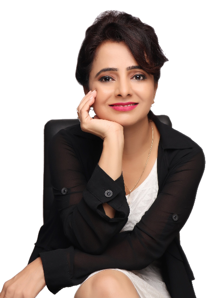 Honey Vachhani seated in a thoughtful pose, wearing black attire